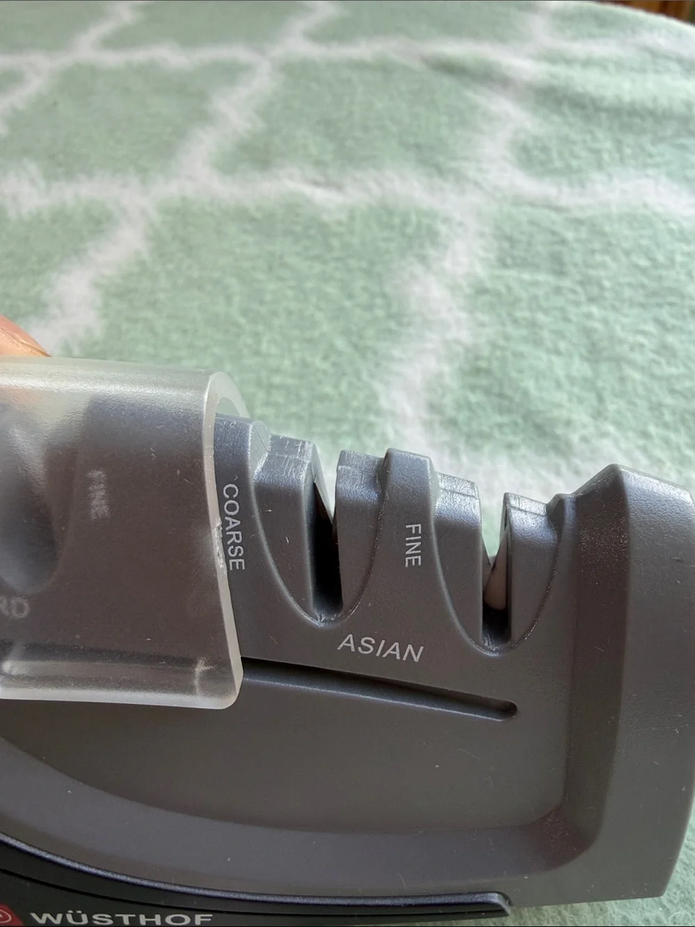 Wüsthof 4-Stage Handheld Knife Sharpener in Black and Gray